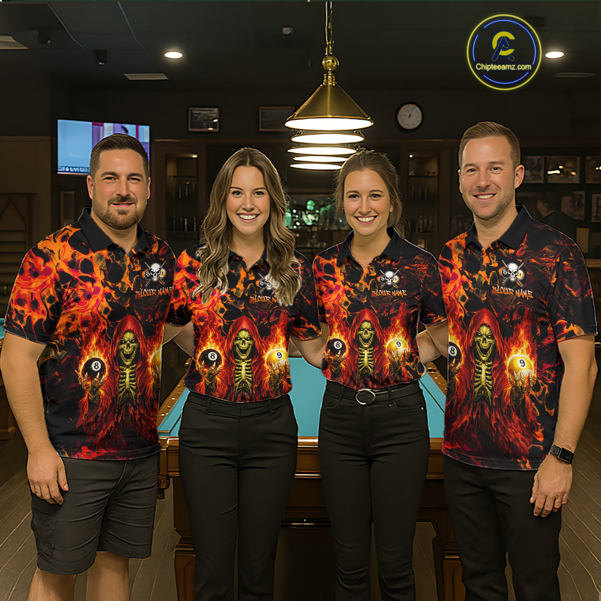 Four people wearing matching shirts with a fiery design in a bar setting.