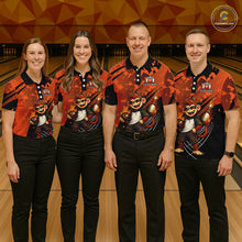 Load image into Gallery viewer, Four people standing together in a bowling alley wearing matching custom bowling shirts with a orange, and black camouflage pattern and a cartoon monkey graphic.
