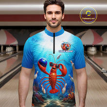 Load image into Gallery viewer, Man wearing a blue and red lobster-themed bowling shirt in a bowling alley.