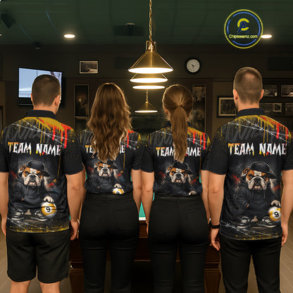 Four people standing with their backs to the camera in a dimly lit indoor venue, wearing matching black short-sleeve team shirts with a large bulldog graphic and 'TEAM NAME' text on the back.