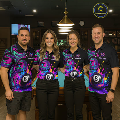 Four people standing together in a dimly lit bar or pool hall, wearing matching black polo shirts with a colorful neon-style graphic featuring an 8-ball and the text 'YOUR NAME' 