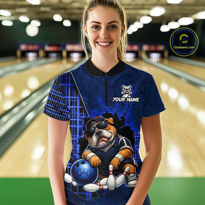 A woman wearing custom blue bulldog bowling quarter-zip shirt front view featuring a tough cartoon mascot and bowling ball, displaying Your Name, at the bowling alley