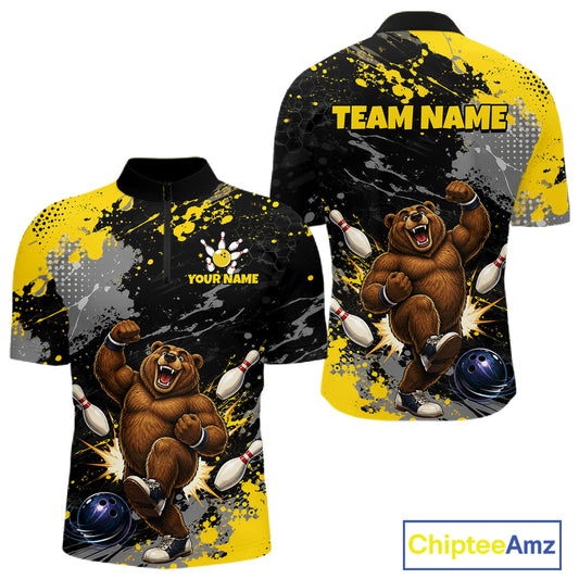Custom short-sleeve polo shirt shown from front and back, featuring a bold bowling-themed graphic with a roaring brown bear, bowling pins, blue balls, black and yellow paint splatter, and placeholder text reading 'YOUR NAME' and 'TEAM NAME'.