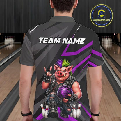 A man viewed from behind wearing a dark gray short-sleeve bowling shirt with a large graphic of a punk pig character holding a purple bowling ball. The shirt features 'TEAM NAME' printed in white on the back, and the background shows bowling lanes.