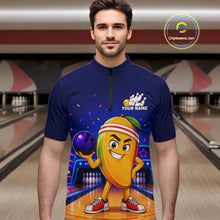 Load image into Gallery viewer, Man wearing a blue shirt with a cartoon character holding a bowling ball in a bowling alley.