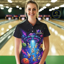 Load image into Gallery viewer, Woman wearing a colorful bowling shirt with UFO design in a bowling alley.