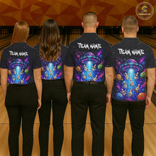 Load image into Gallery viewer, Four people wearing matching shirts with a colorful design on a bowling alley.