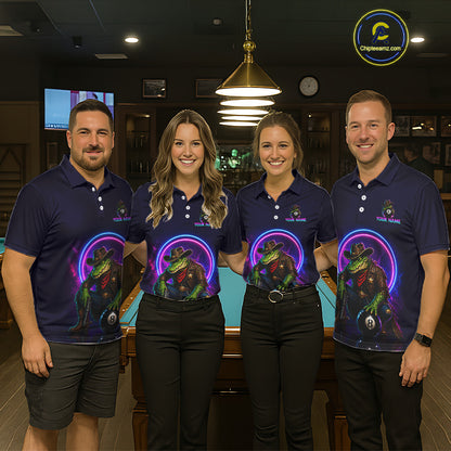 Four people wearing matching blue polo shirts with a colorful frog graphic in a bar setting.