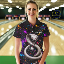 Load image into Gallery viewer, Woman wearing a colorful bowling shirt with a snake design in a bowling alley.