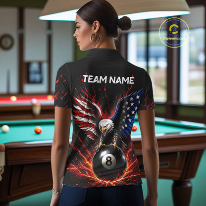 Person wearing a black t-shirt with an eagle and number 8 design in a pool hall.