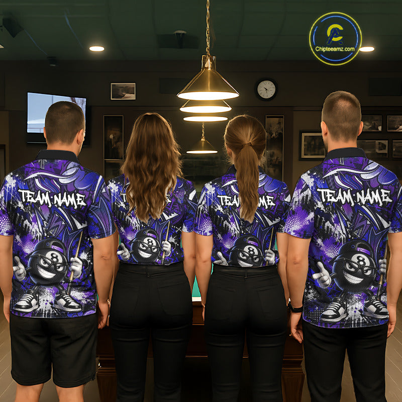 Four people wearing matching purple bowling shirts with a team name on a bowling alley.