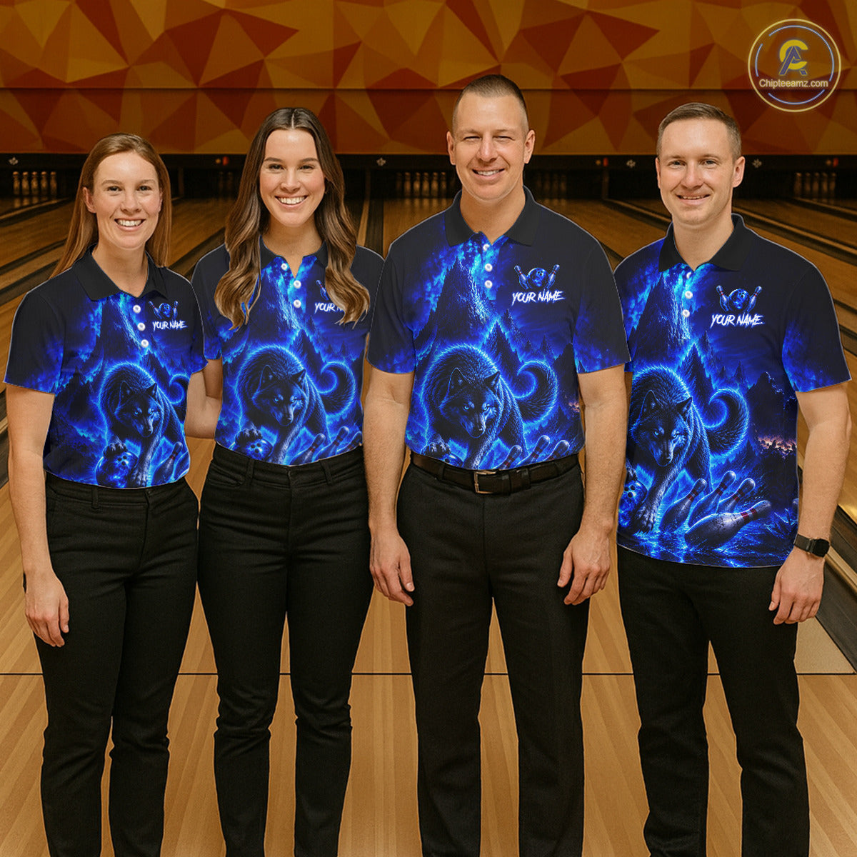 Four people wearing matching blue bowling shirts with a logo on a bowling alley.