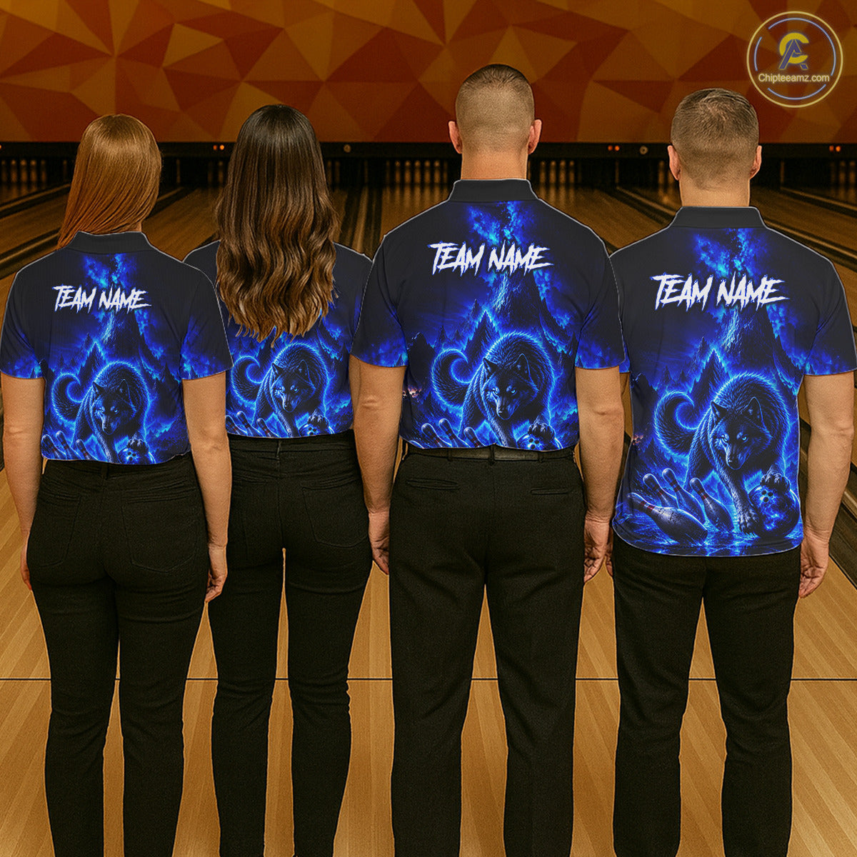 Four people wearing matching blue and black shirts with 'Team Name' text on a bowling alley floor.