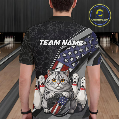 A man wearing custom black patriotic cat bowling polo shirt back view featuring an American flag, bowling ball and honeycomb pattern, displaying Team Name, at the bowling alley