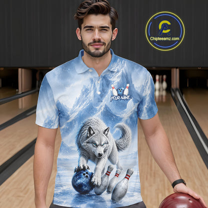 Man wearing a blue polo shirt with a wolf design in a bowling alley.