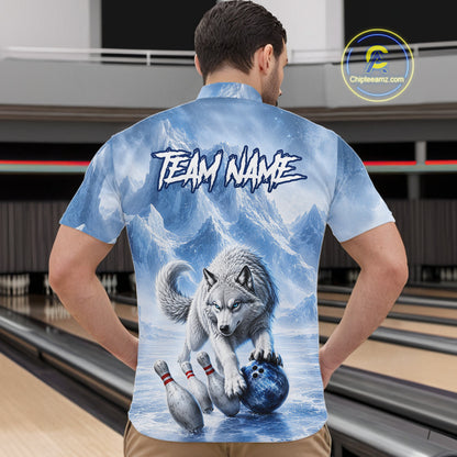 Man wearing a blue shirt with a wolf design and 'TEAM NAME' text in a bowling alley.