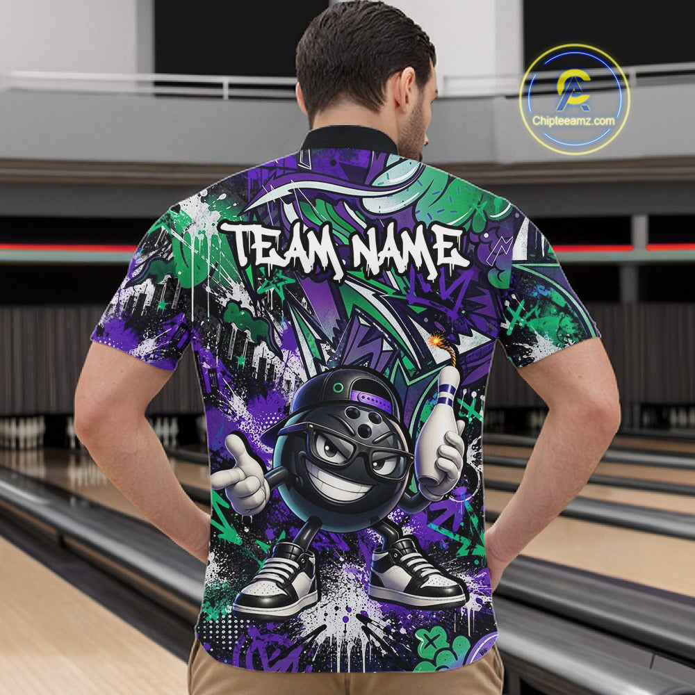 Man wearing a colorful bowling shirt with a cartoon bowling ball design in a bowling alley.
