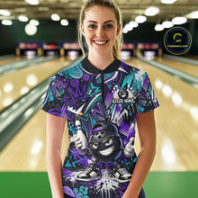 Load image into Gallery viewer, Person wearing a colorful bowling shirt with a graphic design in a bowling alley.
