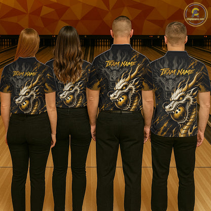 Four people standing with their backs to the camera in a bowling alley, wearing matching dark short-sleeve shirts with a large gold and black dragon graphic and the text 'TEAM NAME' on the back.