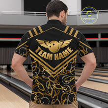 Load image into Gallery viewer, Male model wearing a custom black gold bowling quarter-zip shirt back view displaying the personalized team name above a golden winged bowling ball graphic at the bowling alley