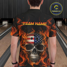 Load image into Gallery viewer, Person wearing a black bowling shirt with a fiery skull design and 'TEAM NAME' text at a bowling alley.