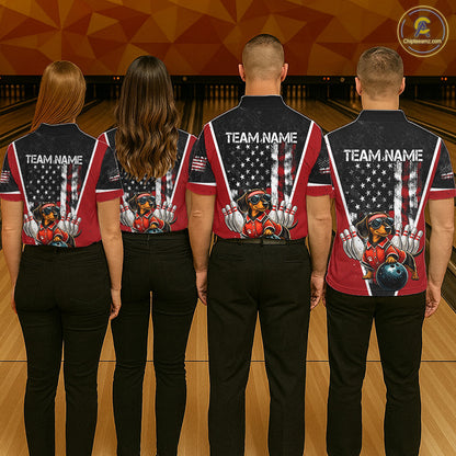 Four bowlers standing from the back in a bowling alley, wearing matching dark red and black bowling shirts with a patriotic American flag design and a bowling pin graphic on the back. The shirts have 'TEAM NAME' printed on the upper back.