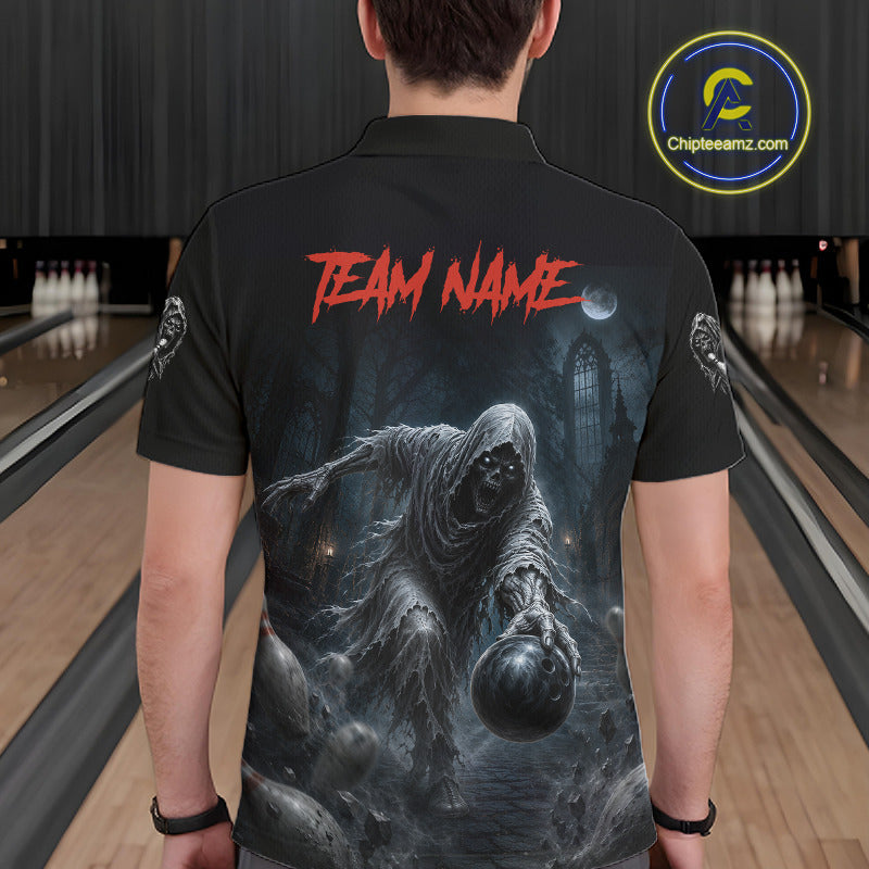 A person shown from the back wearing a black short-sleeve bowling shirt with a large horror-themed graphic on the back. The shirt features red 'TEAM NAME' text and a dark ghostly figure holding a bowling ball in a haunted house scene.