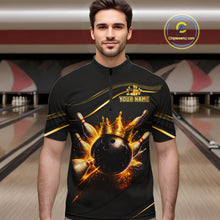 Load image into Gallery viewer, Man wearing custom black gold bowling quarter-zip shirt front view featuring a fiery bowling ball and flame burst effect, displaying Your Name, at the bowling alley