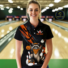 Load image into Gallery viewer, Women wearing a black Halloween bowling polo featuring a raccoon wearing an orange bandana, ghost and pumpkin accents, bowling pins and ball, with personalized name and team name text.