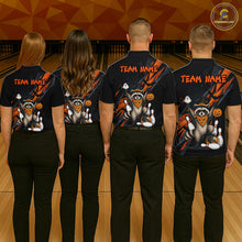 Load image into Gallery viewer, Four people wearing a black Halloween bowling quarter zip featuring a raccoon wearing an orange bandana, ghost and pumpkin accents, bowling pins and ball, with personalized name and team name text.