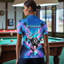 Load image into Gallery viewer, Women wearing personalized billiards polo shirt with an eight ball character moving through a tropical scene with palm trees and sunset reflections.