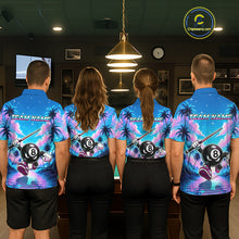 Load image into Gallery viewer, Four people wearing personalized billiards polo shirt with an eight ball character moving through a tropical scene with palm trees and sunset reflections.