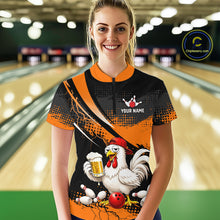 Load image into Gallery viewer, Woman wearing a orange and black bowling quarter zip featuring a chicken holding a beer mug, red bowling ball, scattered pins, and custom your name text.