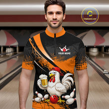 Load image into Gallery viewer, Man wearing a orange and black bowling quarter zip featuring a chicken holding a beer mug, red bowling ball, scattered pins, and custom your name text.