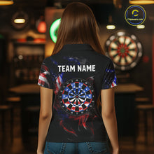 Load image into Gallery viewer, Person wearing a black darts polo featuring patriotic American flag smoke graphics, dartboards, blue darts, and custom team and player name text.