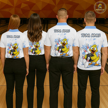 Four people standing from the back in a bowling alley, wearing matching white short-sleeve bowling shirts with a blue collar, black pants, and a large cartoon duck graphic on the back with the text 'TEAM NAME'.