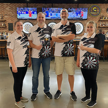 Load image into Gallery viewer, Four people wearing a beige and black darts polo featuring a bald eagle, torn-flag graphics, dartboard designs, and custom team text.