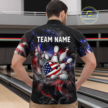 Load image into Gallery viewer, Man wearing a black bowling shirt with American flag design and 'TEAM NAME' text at a bowling alley.