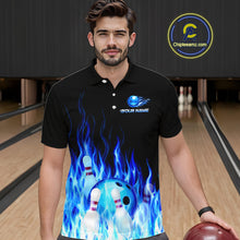 Load image into Gallery viewer, Man wearing a black polo shirt with a blue and white design of a bowling ball and pins, standing in a bowling alley.