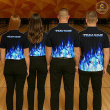 Load image into Gallery viewer, Four people wearing black shirts with blue flame designs and 'TEAM NAME' text on a bowling alley background.
