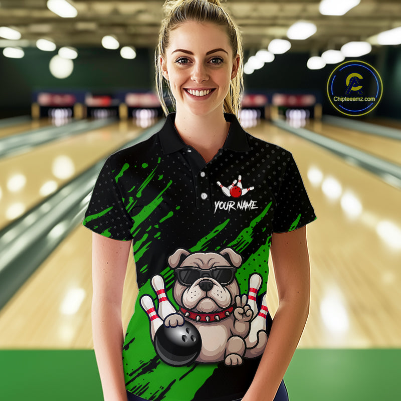 Women’s green Bulldog bowling polo shirt, front view on female model in bowling lane 
