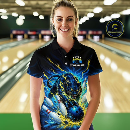 Woman wearing a custom bowling shirt with a panther design in a bowling alley.