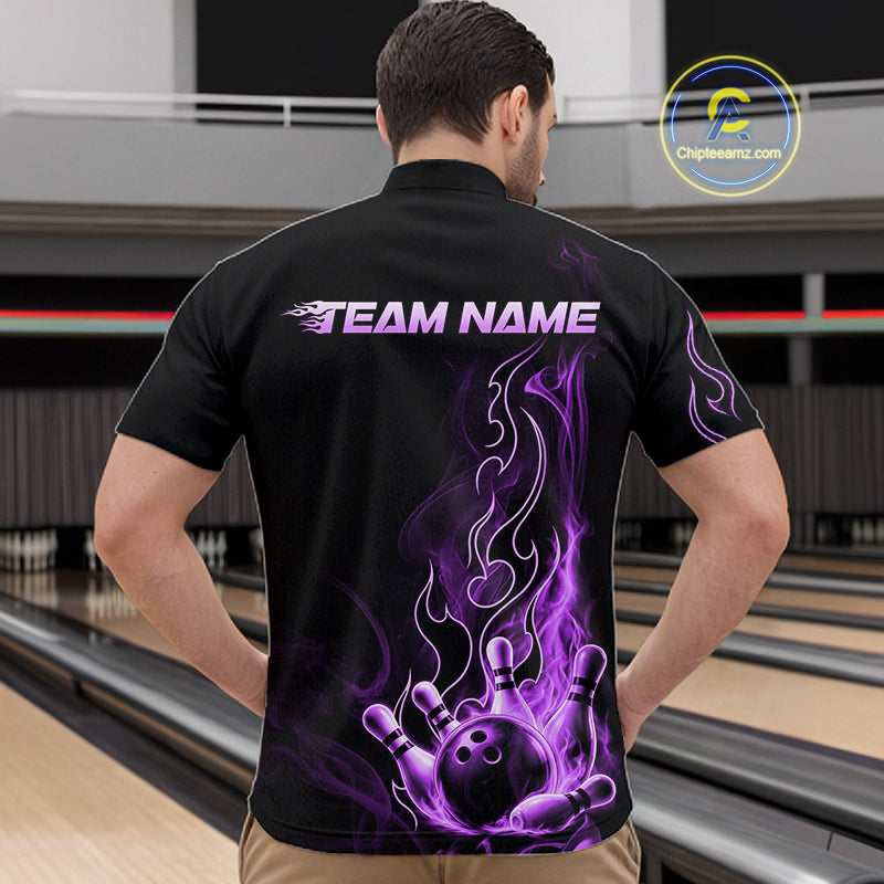 A man viewed from behind wearing a black short-sleeve bowling shirt with a purple and white flame graphic and the text 'TEAM NAME' across the upper back. Bowling lanes are visible in the background, and a 'ChipteeAmz.