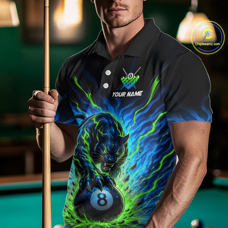 Person wearing a black polo shirt with a colorful design of a panther and number 8 ball, holding a pool cue in a billiards setting.