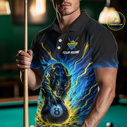 Person wearing a black polo shirt with a panther and pool ball design, holding a pool cue in a billiards setting.