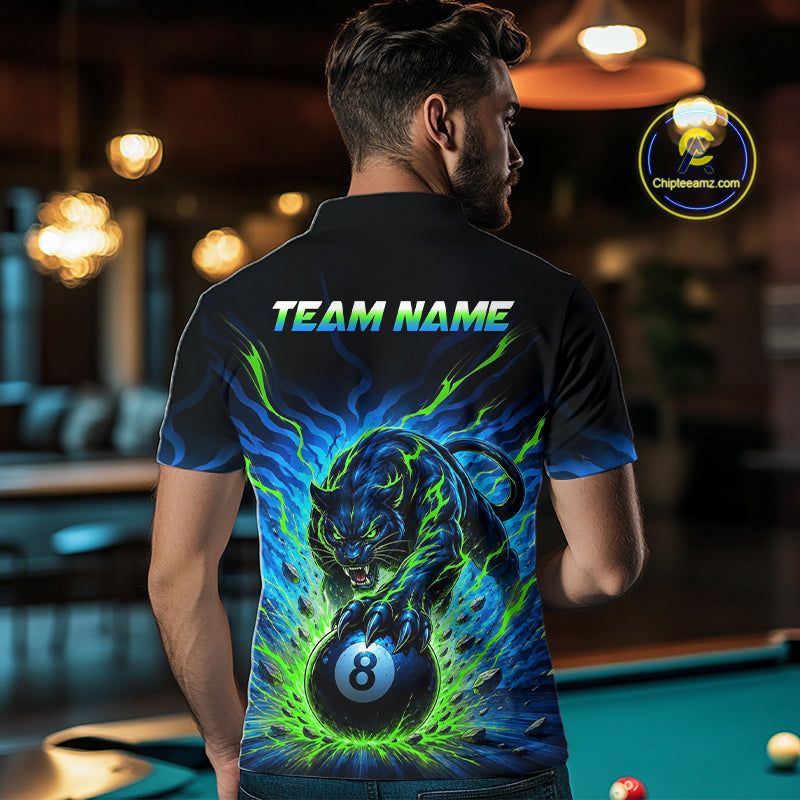 Person wearing a black t-shirt with a colorful design and 'TEAM NAME' text, standing in a pool hall.