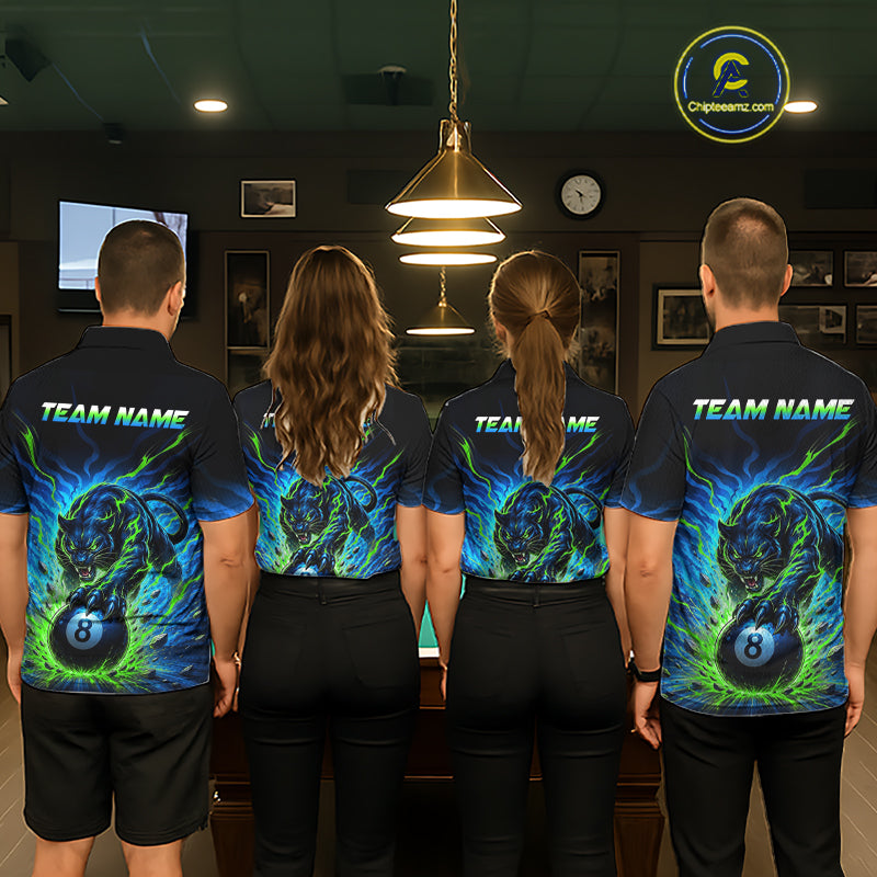 Four people wearing matching bowling shirts with a panther design in a bowling alley.