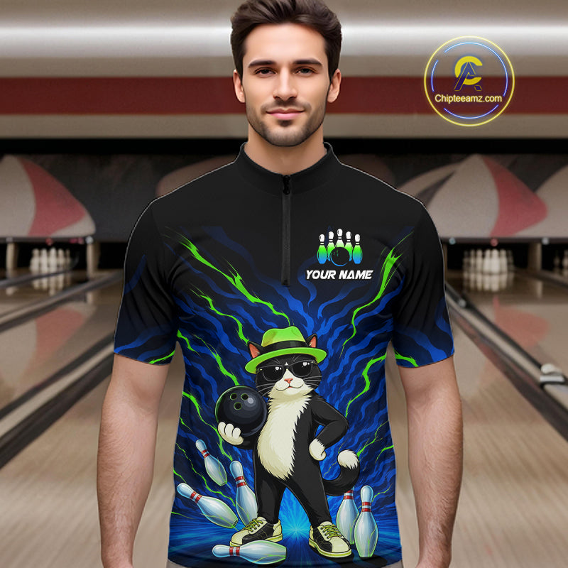A man wearing a black short-sleeve zip-up cycling jersey with a colorful bowling-themed graphic featuring a cat in a green hat and bowling pins, set against a blurred bowling alley background. A 'Chipeamz.