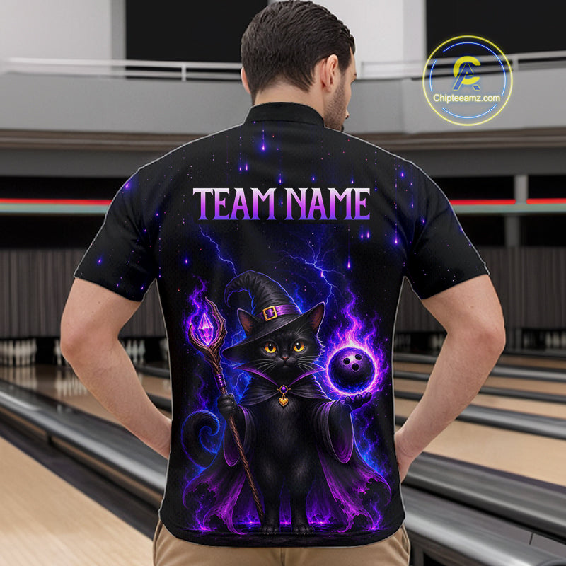 A man viewed from behind wearing a black short-sleeve bowling shirt with a colorful graphic of a black cat in a wizard hat surrounded by purple lightning effects, with the text 'TEAM NAME' printed across the upper back. The background shows bowling lanes.