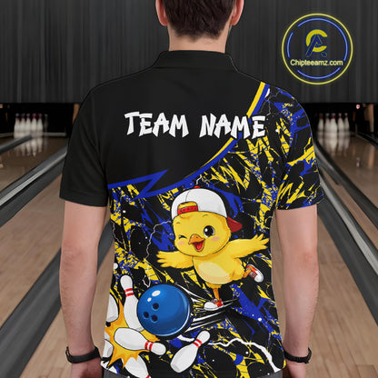 Person wearing a colorful bowling-themed shirt with a cartoon chicken character in a bowling alley.